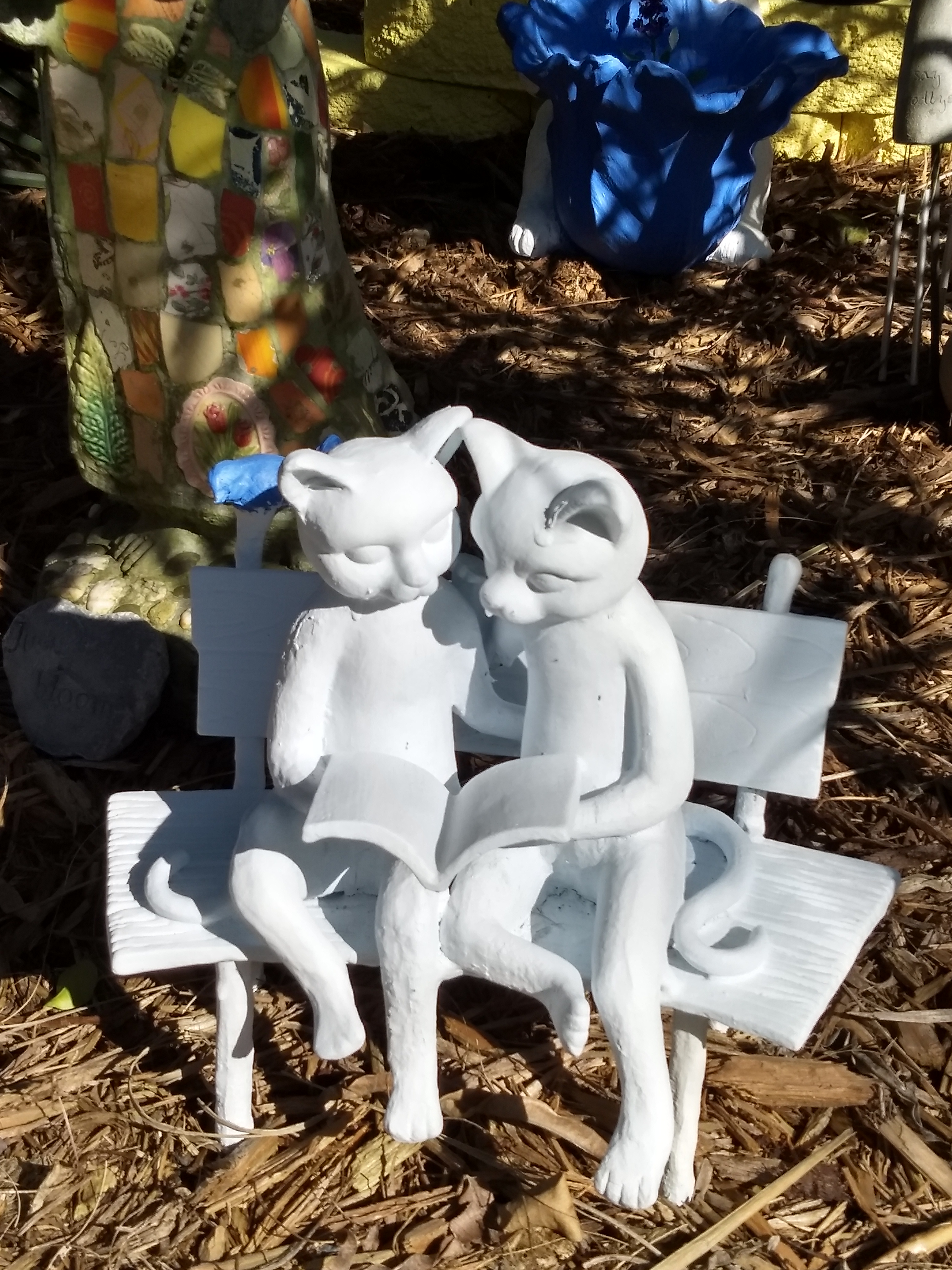 Cats on a bench